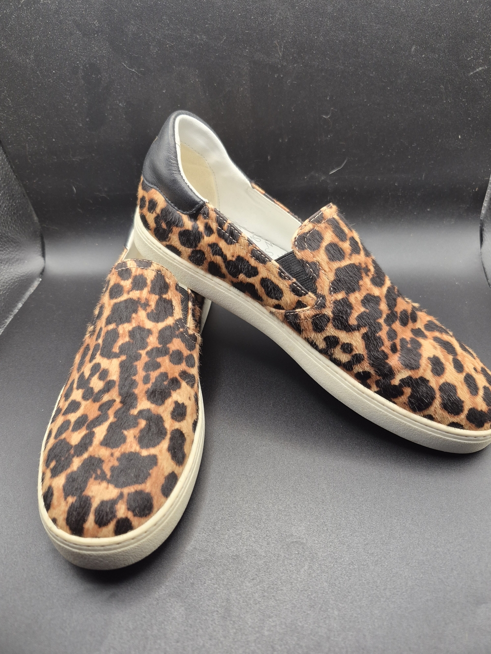 Stewart Weitzman Calf Hair Leopard Print Slip-On Sneakers in Tan and Black